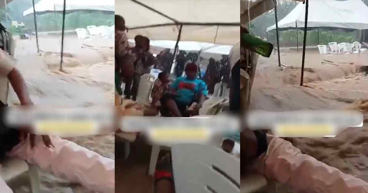 “If you chop finish, be ready to swim” – Party guests r!sk it all for jollof rice while celebrating in the middle of a fl00d (WATCH)