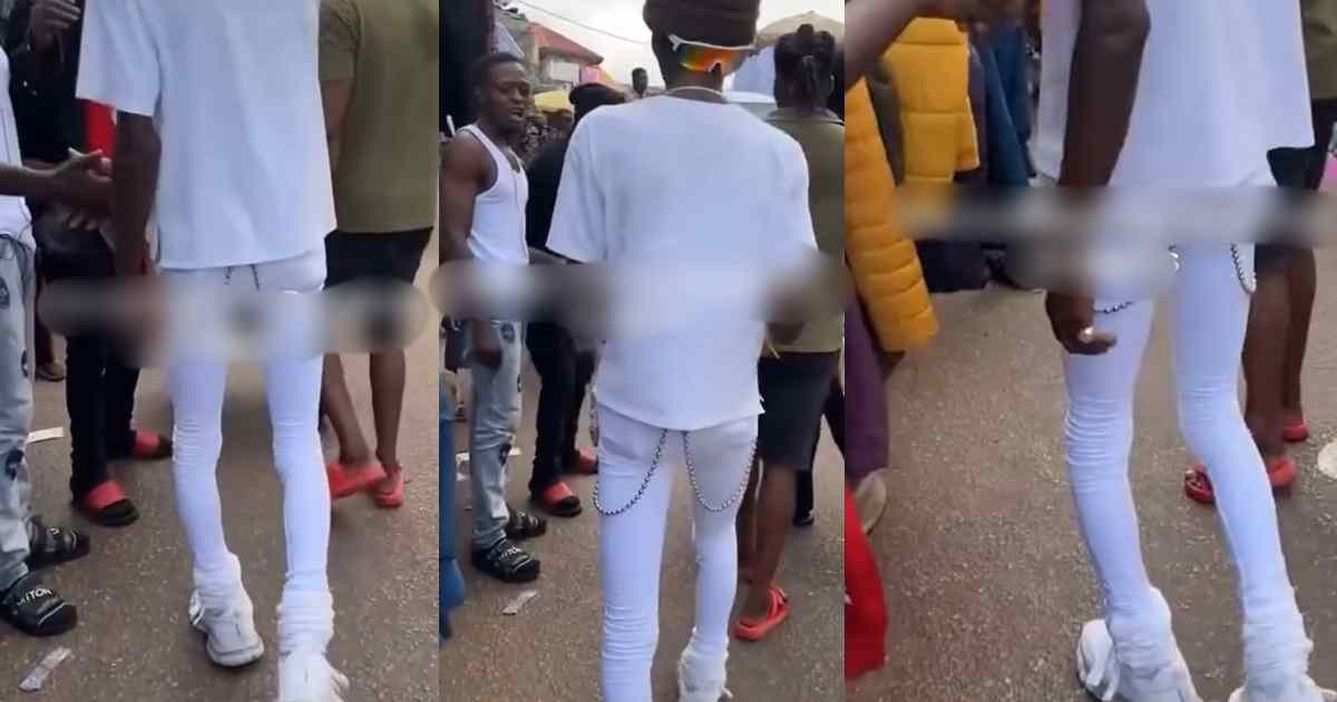 “how did he even put them on” – Man Turns Heads As He Rocks White Skinny Jeans Confidently At A Local Market (WATCH)