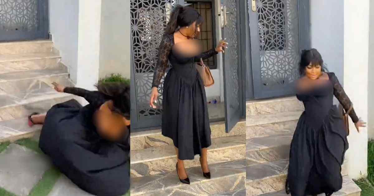 “I won’t stand up o” – Emb@rrassing moment a Nigerian lady tr!ps over heels on stairs in a video shoot (WATCH)