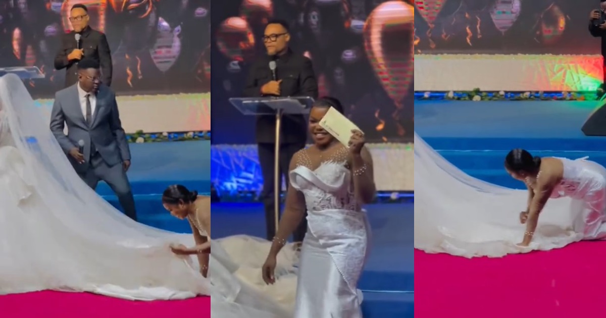 Pastor gifts bridesmaid ₦50,000 for being humble enough to adjust the bride’s gown on her knees (VIDEO)