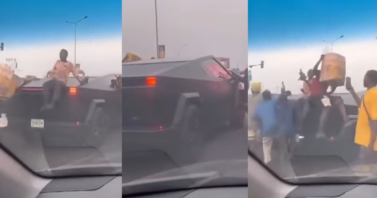 “This is why people drive with kob0ko” – Tongue w@gs as street hawkers hover around a Cyber truck in Lagos traffic (WATCH)