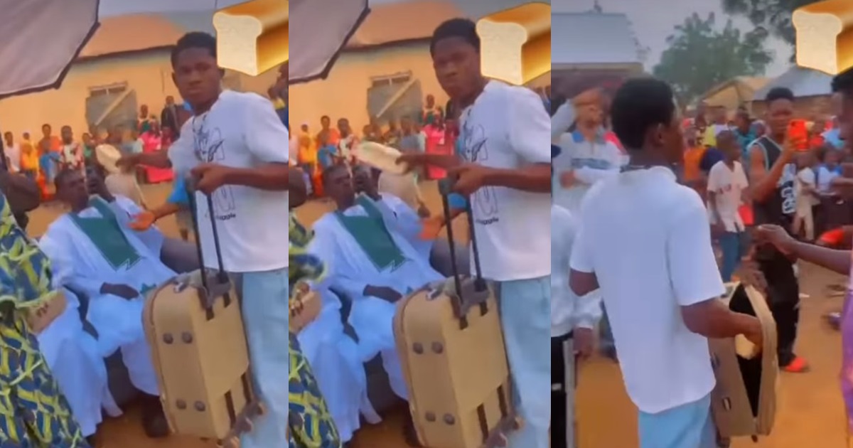 Man showers newlywed couple with ‘loaves of bread’ on their wedding day (VIDEO)