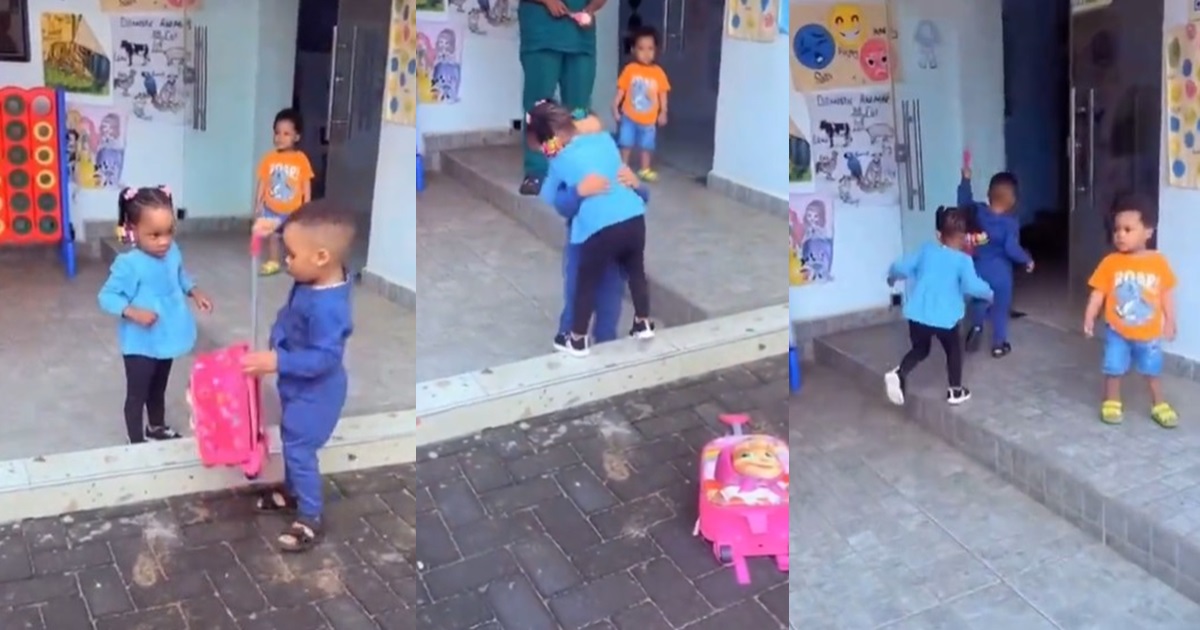 “This boy is more Loving and Caring than some matured men” – Little boy warms hearts as he embraces and assists his classmate with her bag on their first day of school (WATCH)
