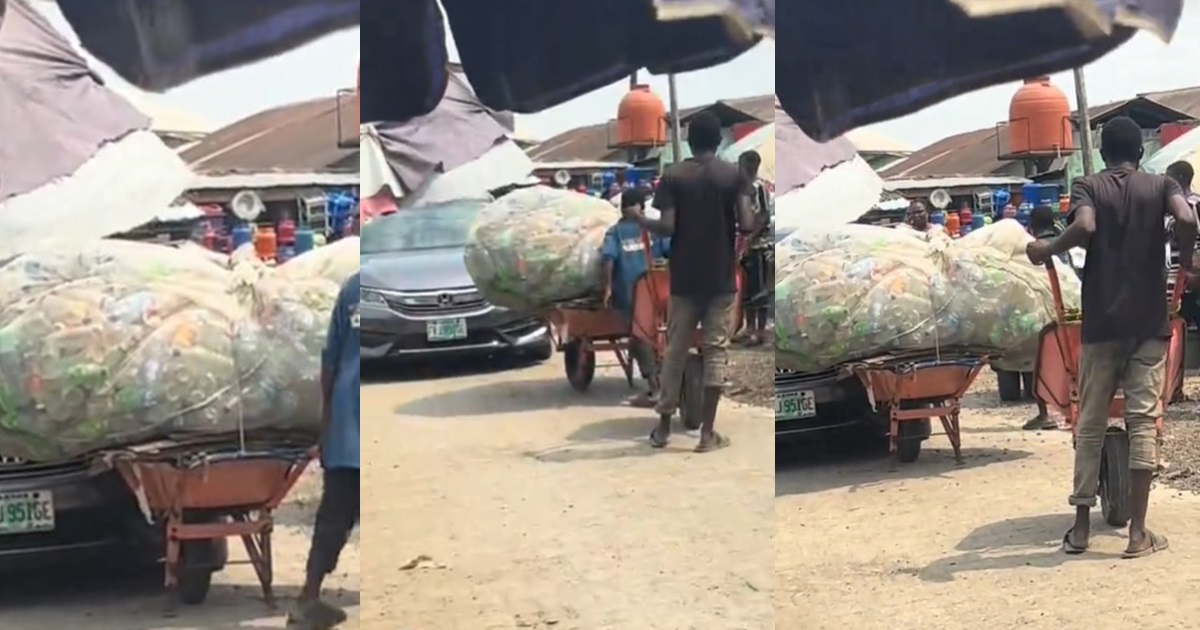 Drama ensúes as a wheelbarrow pusher bl0cks a car on a roadway at a local market (VIDEO)