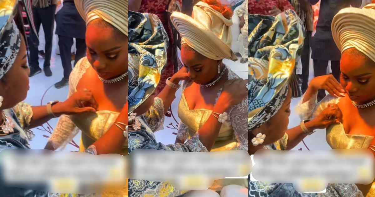 Nigerian mum tries to cover her daughter’s cleavage as she blesses her during her wedding ceremony (WATCH)