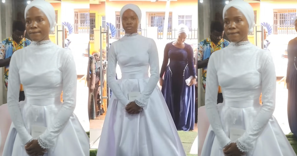 Bride chooses to hold a Bible instead of a bouquet as she walks down the aisle (VIDEO)