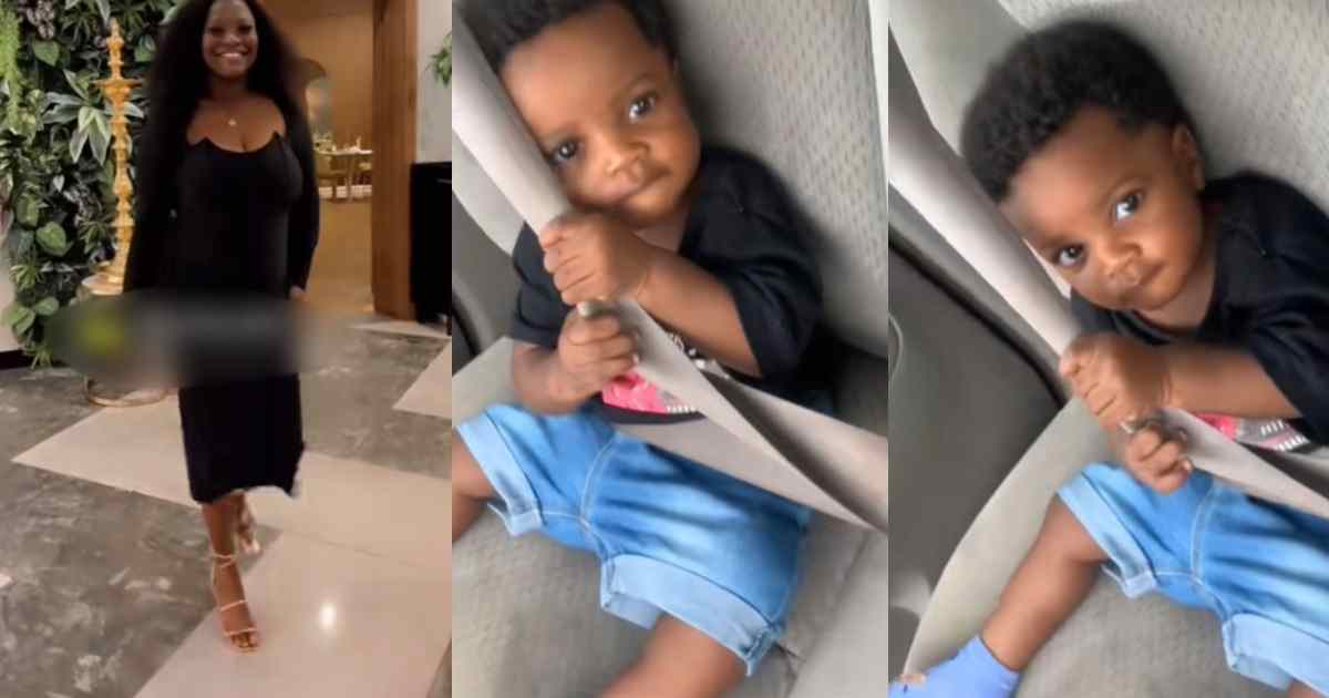 “He doesn’t trust my driving skills” –  Woman says as her 8-month-old son gripped his seatbelt tightly while she drove (WATCH)