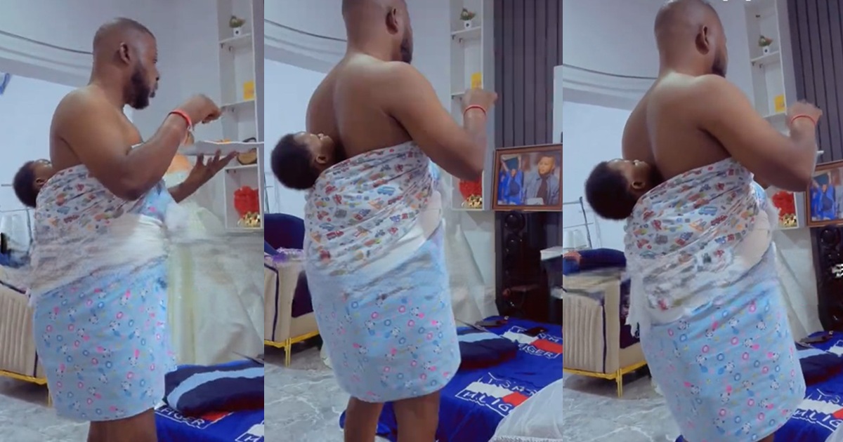 “bundle of joy has been showing him shege” – Wife shares video of husband standing to eat because he’s backing his ‘bundle of joy’ (WATCH)