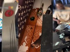 Man accidentally breaks centre table after attempting to cút his birthday cake with a cutlass (Watch)