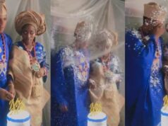 Moment a couple got covered in artificial snow spray during theor cake cutting (Video)