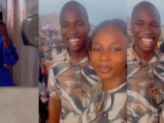 Lady excited after randomly twinning with a stranger in matching outfits.