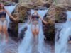 “I first nearly craze” – Lady loses wig while enjoying herself under a waterfall at a resort (Watch)