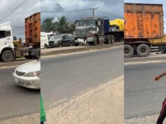 Panic as two heavy trucks drive on pavement to beat gridlock on major road (Watch)