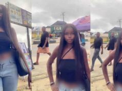 Lady fumes after passerby body-sh@mes her while filming video (Watch)