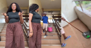 Lady forced to leave staircase after cleaner begins mopping exact spot she was using to record video (Watch)