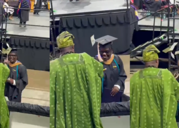Proud Nigerian dad sprays money on his son at his graduation abroad (Watch)