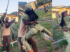 Hilarious Moment Female Corps Member Wraps Legs Around Training Officer During Man O’ War Exercise